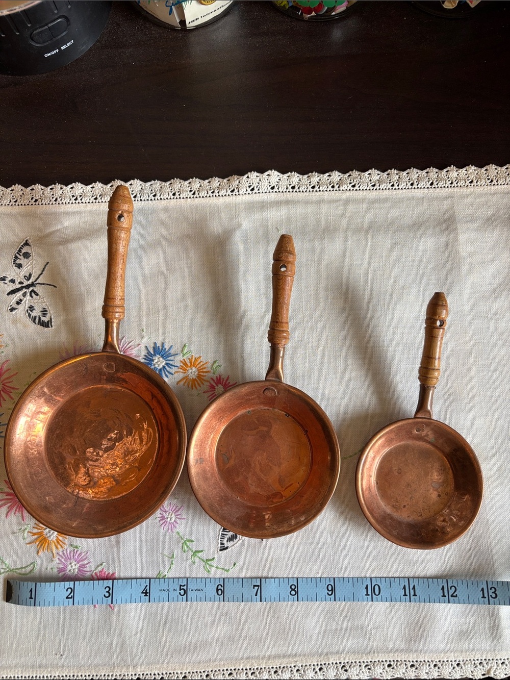VINTAGE set of three decorative copper miniature frying pans with turned wooden